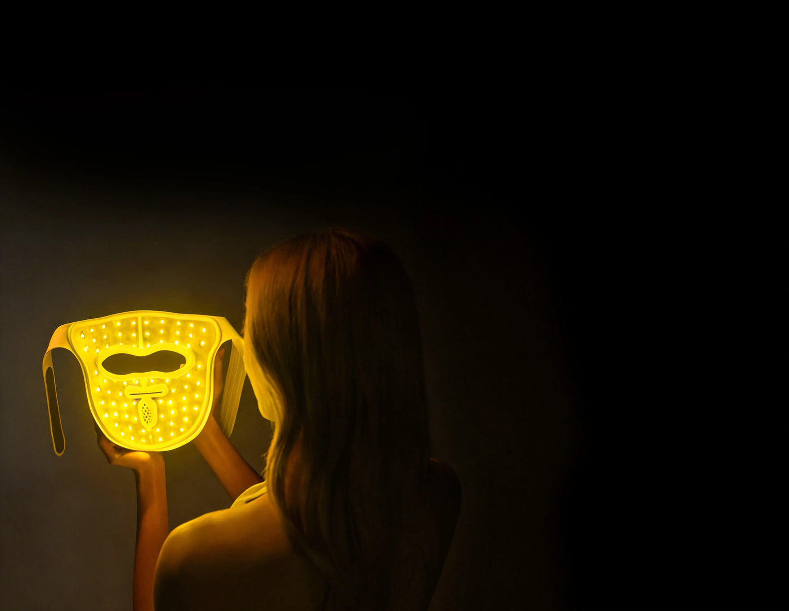 Dreame Chrona masque anti-âge à photons mode éclat (jaune 590 nm) – unifie le teint et renforce la luminosité naturelle.