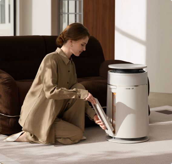 Le bac de collecte des poils du Dreame FP10 Purificateur d'air pour animaux se retire facilement et proprement sans salir les mains.